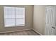 Bedroom with a window and a double door closet providing ample space at 5000 Culbreath Key Way # 1-220, Tampa, FL 33611