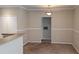 Cozy dining room with neutral walls, a hanging light fixture, and entry to a closet at 5000 Culbreath Key Way # 1-220, Tampa, FL 33611