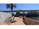 Waterfront dock area with seating and a view of the bridge at 5000 Culbreath Key Way # 1-220, Tampa, FL 33611