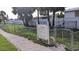Community dog park with rules posted and ample space for recreation at 5000 Culbreath Key Way # 1-220, Tampa, FL 33611