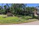 The lush landscaped entrance sign for Culbreath Isles, a lovely waterfront community at 5000 Culbreath Key Way # 1-220, Tampa, FL 33611