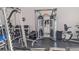 Community gym featuring weight training equipment and machines for a full body workout at 5000 Culbreath Key Way # 1-220, Tampa, FL 33611