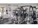 Community gym featuring weight training equipment, mirrors, and windows for an energizing workout at 5000 Culbreath Key Way # 1-220, Tampa, FL 33611