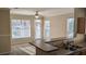 Bright living room with large windows and neutral carpet and paint at 5000 Culbreath Key Way # 1-220, Tampa, FL 33611