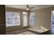 Sun-filled living room with large windows and a glass door that brings in natural light at 5000 Culbreath Key Way # 1-220, Tampa, FL 33611