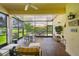 Covered lanai with outdoor seating, a ceiling fan, and views of the yard at 5103 Shady Stone Pl, Wimauma, FL 33598