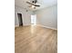 Spacious bedroom with vaulted ceilings, fan, and hard wood floors at 5423 Sweetwater Terrace Cir, Tampa, FL 33634