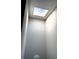 Looking up at a skylight in the ceiling that offers natural light into the room at 5423 Sweetwater Terrace Cir, Tampa, FL 33634