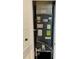 HVAC unit within a closet featuring an energy guide sticker at 5423 Sweetwater Terrace Cir, Tampa, FL 33634