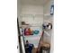 White shelving in a storage closet filled with various household items and supplies at 5423 Sweetwater Terrace Cir, Tampa, FL 33634