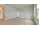 Bright, spacious bedroom with neutral carpet and trimwork, offering a serene retreat at 5546 Spanish Moss Cv, Bradenton, FL 34203