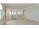 Spacious bonus room with plush carpeting, bright windows, and ample natural light at 5546 Spanish Moss Cv, Bradenton, FL 34203