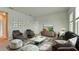 Stylish living room with modern furniture, plush rug, and chic decor at 5546 Spanish Moss Cv, Bradenton, FL 34203