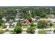 An aerial shot showing the home's location within a mature, tree-lined neighborhood at 5690 82Nd N Ter, Pinellas Park, FL 33781