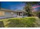 The backyard features a screened lanai, grassy area, and a privacy fence, perfect for outdoor enjoyment at 5690 82Nd N Ter, Pinellas Park, FL 33781