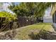 Backyard featuring a decorative wooden fence and plenty of green space at 5690 82Nd N Ter, Pinellas Park, FL 33781