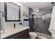 Modern bathroom featuring a glass-enclosed shower, stylish vanity, and contemporary fixtures at 5690 82Nd N Ter, Pinellas Park, FL 33781