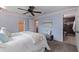 Tranquil bedroom with ensuite bathroom showcasing a serene color palette and ample natural light at 5690 82Nd N Ter, Pinellas Park, FL 33781