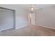 Bedroom with a ceiling fan and a view into the next room at 5690 82Nd N Ter, Pinellas Park, FL 33781