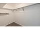 Walk-in closet offering ample storage space with shelving and a hanging rod at 5690 82Nd N Ter, Pinellas Park, FL 33781