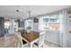 Cozy dining area with a view of the outdoor patio and modern decor at 5936 13Th Ave, New Port Richey, FL 34652
