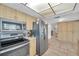 Bright kitchen with stainless steel appliances and light wood cabinetry at 5936 13Th Ave, New Port Richey, FL 34652