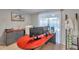 A well-lit office features a modern desk, a rolling chair, and a barn-themed print at 5936 13Th Ave, New Port Richey, FL 34652