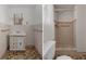 Bathroom featuring custom vanity and shower with tile flooring at 6006 Axelrod Rd, Tampa, FL 33634