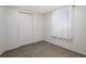 A bright bedroom with a closet at 6006 Axelrod Rd, Tampa, FL 33634