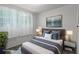 Bedroom staged with large bed and covered with a white rug at 6006 Axelrod Rd, Tampa, FL 33634
