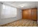 This bedroom features a closet and an air conditioning unit at 6006 Axelrod Rd, Tampa, FL 33634