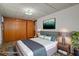 Bedroom staged with bed, rug, and end tables at 6006 Axelrod Rd, Tampa, FL 33634