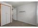 Bedroom with closet and shelving at 6006 Axelrod Rd, Tampa, FL 33634