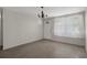 Inviting living room with sheer curtains and chandelier at 6006 Axelrod Rd, Tampa, FL 33634