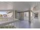 Hallway entrance to condos featuring painted railings and an exit sign for safety at 6826 Stones Throw N Cir # 11308, St Petersburg, FL 33710