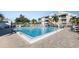 The community has a sparkling pool with lounge chairs and tables for relaxing and socializing at 6826 Stones Throw N Cir # 11308, St Petersburg, FL 33710