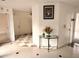 Bright foyer featuring ceramic tile flooring and views to the living areas at 7031 Drury St, Tampa, FL 33635