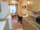 Bright kitchen with modern appliances, and breakfast nook with a view at 802 Brandy Wine Dr # 802, Largo, FL 33771