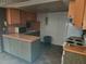 Functional kitchen featuring white appliances and peach-colored countertops at 802 Brandy Wine Dr # 802, Largo, FL 33771