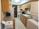 Kitchen featuring granite countertops, modern appliances, and ample cabinet space at 802 Brandy Wine Dr # 802, Largo, FL 33771