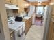 Kitchen with modern appliances, granite countertops and adjacent dining nook at 802 Brandy Wine Dr # 802, Largo, FL 33771