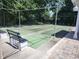Community recreational courts and bench seating surrounded by shade trees at 802 Brandy Wine Dr # 802, Largo, FL 33771