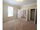 Bedroom with neutral carpet and ample closet space at 8320 Manor Club Cir # 4, Tampa, FL 33647