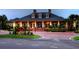 The Hampton Club information center is a community hub, with palm trees and lush gardens at 8320 Manor Club Cir # 4, Tampa, FL 33647