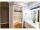 Bathroom with white vanity and shower-tub combo at 10196 Seminole Island Dr, Largo, FL 33773