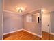 Dining room has updated light fixture and new wood-look floors at 10196 Seminole Island Dr, Largo, FL 33773