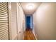 Hallway boasts wood-look floors and ample closet space at 10196 Seminole Island Dr, Largo, FL 33773