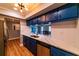 Modern kitchen with stainless steel dishwasher and eat in kitchen at 10196 Seminole Island Dr, Largo, FL 33773