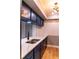 Updated kitchen features stainless steel appliances, new countertops and new cabinets at 10196 Seminole Island Dr, Largo, FL 33773