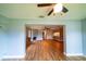 Spacious living room with fireplace and hardwood floors, open concept at 10196 Seminole Island Dr, Largo, FL 33773